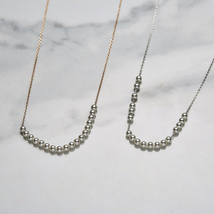 Relay pearls necklace